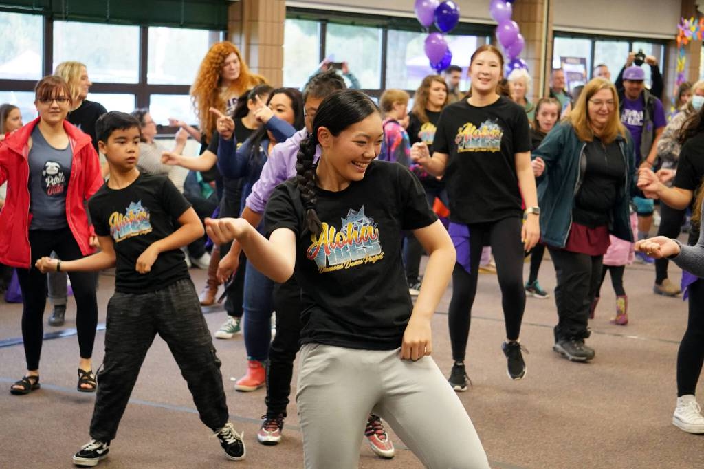 Dancers from the Diamond Dance Project perform ahead of the Walk to End Alzheimers at the Soldotna Regional Sports Complex in Soldotna, Alaska, on Saturday, Sept. 16, 2023. (Jake Dye/Peninsula Clarion)