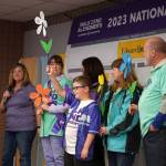 A promise garden flower ceremony is held for the Walk to End Alzheimers at the Soldotna Regional Sports Complex in Soldotna, Alaska, on Saturday, Sept. 16, 2023. (Jake Dye/Peninsula Clarion)