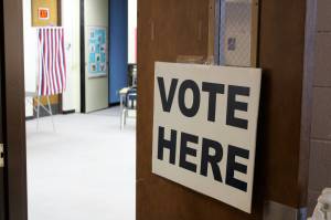 Signage directs voters to voting booths at Soldotna Prep School on Tuesday, Feb. 15, 2023, in Soldotna, Alaska. (Ashlyn OHara/Peninsula Clarion)