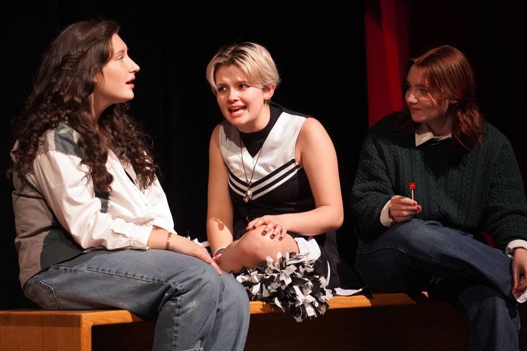 Leora McCaughey, Kry Spurgeon and Oshie Broussard rehearse Lockers at Nikiski Middle/High School in Nikiski, Alaska, on Tuesday, Sept. 19, 2023. (Jake Dye/Peninsula Clarion)