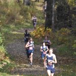 Soldotnas Noble Cassidy leads runners through the last kilometer of the Kenai Peninsula Borough boys varsity race Thursday, Sept. 21, 2023, at Tsalteshi Trails just outside of Soldotna, Alaska. (Photo by Jeff Helminiak/Peninsula Clarion)