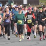 Marathon, half marathon and marathon relay runners start the Kenai River Marathon on Sunday, Sept. 24, 2023, in Kenai, Alaska. (Photo by Jeff Helminiak/Peninsula Clarion)