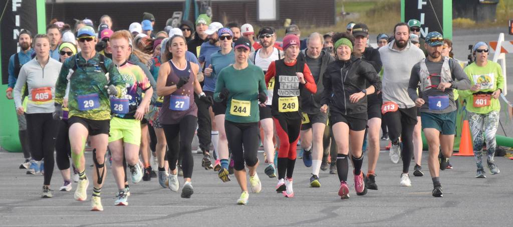 Marathon, half marathon and marathon relay runners start the Kenai River Marathon on Sunday, Sept. 24, 2023, in Kenai, Alaska. (Photo by Jeff Helminiak/Peninsula Clarion)