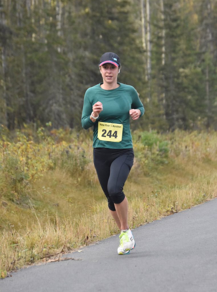 Samantha Wilson of Anchorage runs to victory in the womens half marathon at the Kenai River Marathon on Sunday, Sept. 24, 2023, in Kenai, Alaska. (Photo by Jeff Helminiak/Peninsula Clarion)