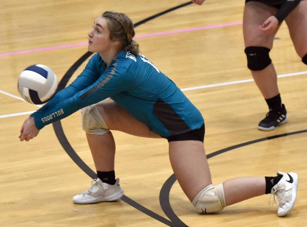 Nikiskis Evelyn Reichert digs up a ball against Soldotna on Thursday, Sept. 28, 2023, at Soldotna High School in Soldotna, Alaska. (Photo by Jeff Helminiak/Peninsula Clarion)