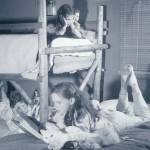 1954 photo by Bob and Ira Spring for Better Homes & Garden magazine
Eldest daughter Martha (foreground) reads to her sisters Lori (top bunk) and Abby.