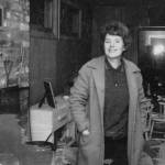 Photo courtesy of the Lancashire Family Collection
Rusty Lancashire smiles for the camera in the frame house that in the late 1950s replaced the Lancashires original homestead log cabin.