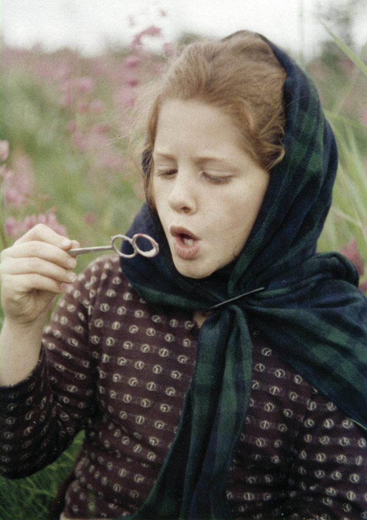 Abby Lancashire, probably in her early teens, blowing bubbles on the family homestead. (Photo courtesy of the Lancashire Family Collection.)