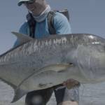 An angler holds up a massive fish in Jacks: A Film by Jako Lucas & Ra Beattie. (Photo courtesy International Fly Fishing Festival)