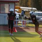 Kenais Bobby Hayes, right, celebrates his game winning touchdown with Sawyer Vann during a Division III playoff game at Justin Maile Field in Soldotna, Alaska, on Saturday, Oct. 7, 2023. (Jake Dye/Peninsula Clarion)