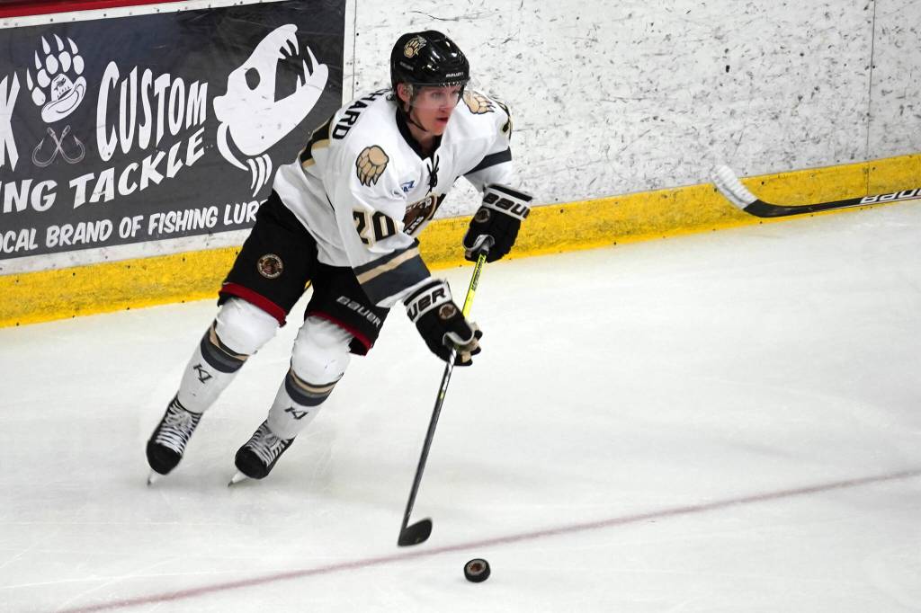 Kenai Rivers Tiziano Pauchard takes control of the puck during a hockey game at Soldotna Regional Sports Complex in Soldotna, Alaska, on Saturday, Oct. 7, 2023. (Jake Dye/Peninsula Clarion)