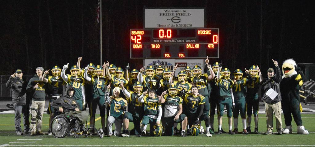 Seward celebrates defeating Nikiski on Saturday, Oct. 7, 2023, in the nine-man football state final at Colony High School in Palmer, Alaska. (Photo by Jeff Helminiak/Peninsula Clarion)