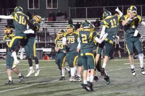 Seward celebrates defeating Nikiski on Saturday, Oct. 7, 2023, in the nine-man football state final at Colony High School in Palmer, Alaska. (Photo by Jeff Helminiak/Peninsula Clarion)