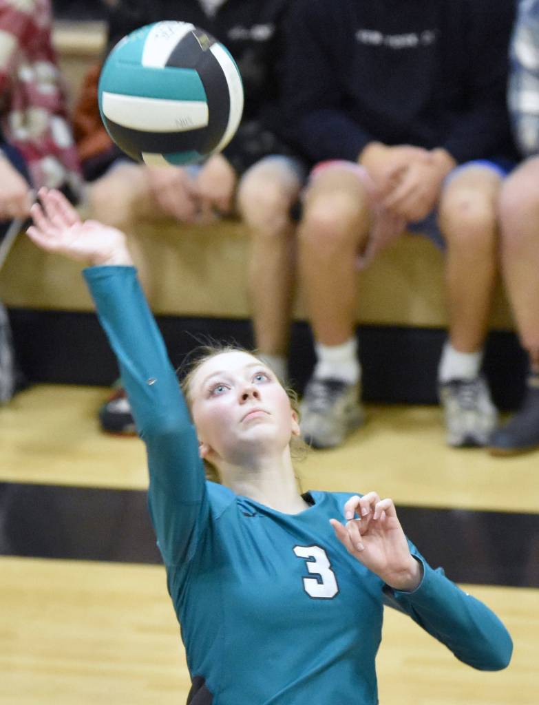 Nikiskis Zoey Ellis attacks against Homer on Thursday, Oct. 12, 2023 at Nikiski Middle-High School in Nikiski, Alaska. (Photo by Jeff Helminiak/Peninsula Clarion)