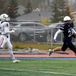 Soldotnas Gehret Medcoff outpaces North Poles Kamden Stark to score a touchdown in the Division II semifinal at Justin Maile Field in Soldotna, Alaska, on Saturday, Oct. 14, 2023. (Jake Dye/Peninsula Clarion)