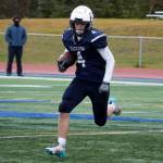 Soldotnas Dax Walden runs with the ball while playing in the Division II semifinal against North Pole at Justin Maile Field in Soldotna, Alaska, on Saturday, Oct. 14, 2023. (Jake Dye/Peninsula Clarion)