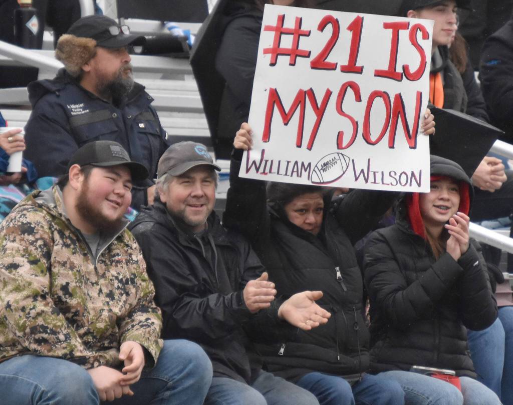 Fans cheer for Kenai Central on Saturday, Oct. 14, 2023, in the Division III state championship game at Service High School in Anchorage, Alaska. (Photo by Jeff Helminiak/Peninsula Clarion)