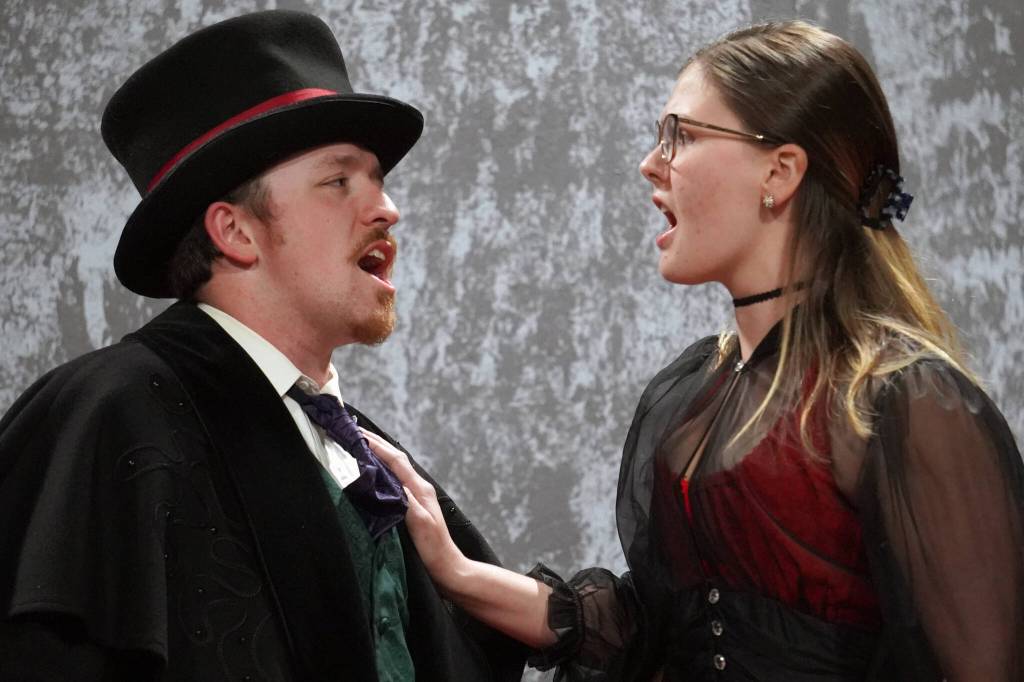 Braeden and Alyeska Garrett rehearse Jekyll and Hyde: the Musical at the Kenai Performers Theatre in Kenai, Alaska, on Wednesday, Oct. 18, 2023. (Jake Dye/Peninsula Clarion)