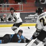 Dylan Contreras of the Kenai River Brown Bears watches as his shot rebounds to Nick Stevens (far right), who would score against the Wisconsin Windigo on the play Friday, Oct. 20, 2023, at the Soldotna Regional Sports Complex in Soldotna, Alaska. (Photo by Jeff Helminiak/Peninsula Clarion)