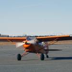 Joel Caldwell returns from a flight in his personal aircraft during Kenai Aviations Fifth Annual Pumpkin Drop at the Kenai Municipal Airport Operations Building on Saturday, Oct. 21, 2023. (Jake Dye/Peninsula Clarion)