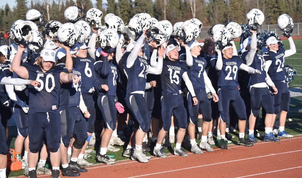 Soldotna celebrates by singing the school song Saturday, Oct. 21, 2023, in the Division II championship game at Service High School in Anchorage, Alaska. (Photo by Jeff Helminiak/Peninsula Clarion)
