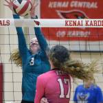 Nikiskis Zoey Ellis puts up a block on Kenai Centrals Sophia Tapley on Tuesday, Oct. 24, 2023, at Kenai Central High School in Kenai, Alaska. (Photo by Jeff Helminiak/Peninsula Clarion)