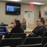 From left: Nikolaevsk charter school academic policy committee members Mariah Kerrone, Chandra Caffroy and Juliana McConnell present their updated charter application to the Kenai Peninsula Borough School District Board of Education on Monay, Oct. 23, 2023 in Soldotna, Alaska. (Ashlyn OHara/Peninsula Clarion)