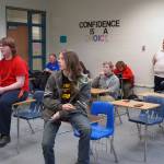 Players, coaches and parents watch as Kenais Boyd Lehmberg and Nikiskis Lincoln Kimbell play the final round of competition for a Super Smash Bros. Ultimate match at Nikiski Middle/High School in Nikiski, Alaska, on Monday, Oct. 23, 2023. (Jake Dye/Peninsula Clarion)