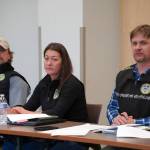 Tony Eskelin, Jenny Gates and Israel Payton listen to questions at a Town Hall Style Meeting held at Soldotna Public Library in Soldotna, Alaska, on Thursday, Oct. 26, 2023. (Jake Dye/Peninsula Clarion)