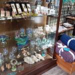 Crafts by Alaska artists are seen at Perfectly Alaskan Creations in Kenai, Alaska, on Tuesday, Oct. 31, 2023. (Jake Dye/Peninsula Clarion)