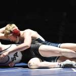 Soldotna's Jacob Strausbaugh wrestles to victory against South's Bohdan Porter on Friday, Nov. 3, 2023, at Soldotna High School in Soldotna, Alaska. (Photo by Jeff Helminiak/Peninsula Clarion)