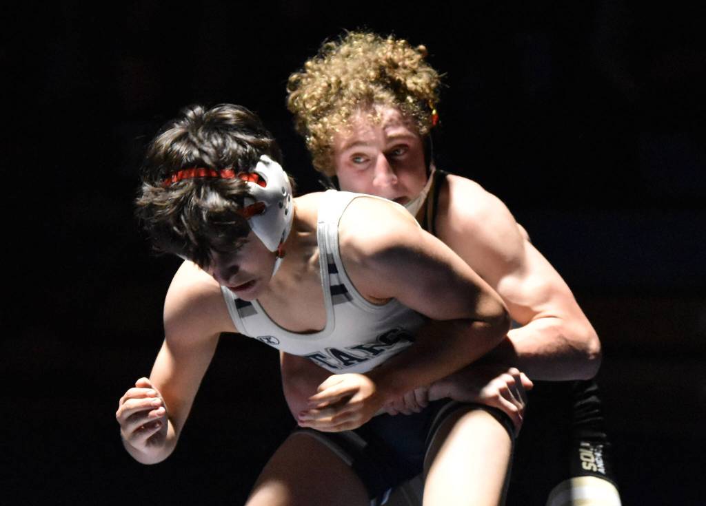 South's Dylan Frawner wrestles to victory against Soldotna's Sam Strouse on Friday, Nov. 3, 2023, at Soldotna High School in Soldotna, Alaska. (Photo by Jeff Helminiak/Peninsula Clarion)