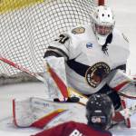 Kenai River Brown Bears goalie Owen Zenone makes a save against the Fairbanks Ice Dogs on Saturday, Nov. 4, 2023, at the Soldotna Regional Sports Complex in Soldotna, Alaska. (Photo by Jeff Helminiak/Peninsula Clarion)