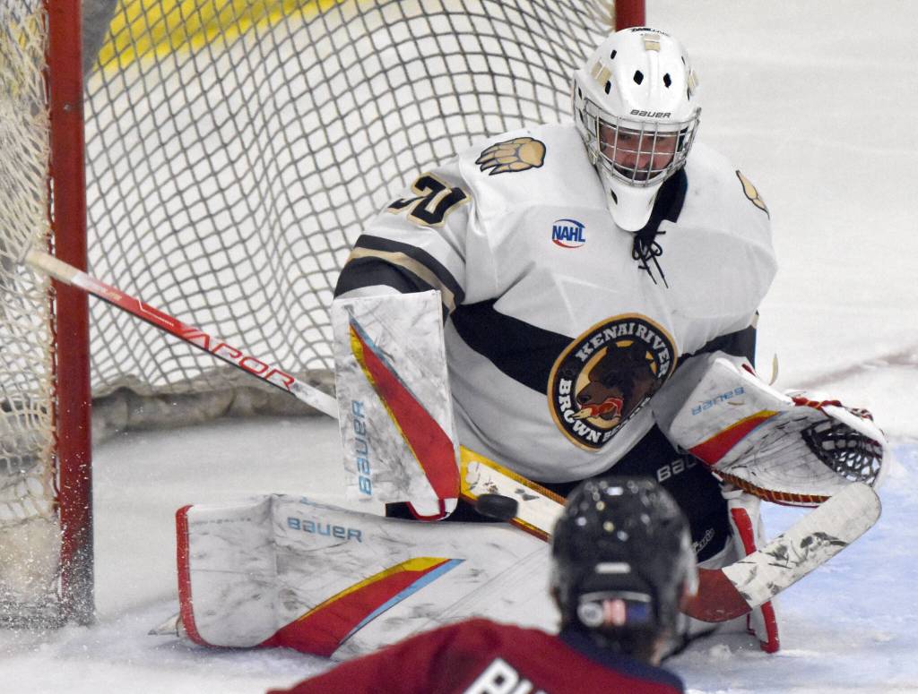 Kenai River Brown Bears goalie Owen Zenone makes a save against the Fairbanks Ice Dogs on Saturday, Nov. 4, 2023, at the Soldotna Regional Sports Complex in Soldotna, Alaska. (Photo by Jeff Helminiak/Peninsula Clarion)
