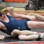 Kenai Centrals Atlas Ruark wrestles Homers Alexander Van Meter at 160 pounds during a dual meet Tuesday, Nov. 7, 2023, at Kenai Central High School in Kenai, Alaska. (Photo by Jeff Helminiak/Peninsula Clarion)