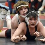 Soldotnas Titus Watts controls Kenai Centrals Jaxson Young at 125 pounds during a dual meet Tuesday, Nov. 7, 2023, at Kenai Central High School in Kenai, Alaska. (Photo by Jeff Helminiak/Peninsula Clarion)