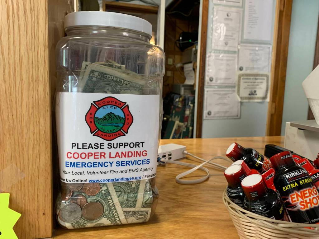 A tip jar collects money for Cooper Landing Emergency Services inside the Sunrise Cafe on Saturday, July 8, 2023 in Cooper Landing, Alaska. (Ashlyn OHara/Peninsula Clarion)