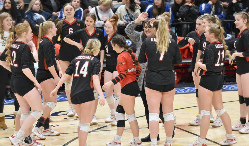 Kenai Central celebrates during a timeout at the Class 3A state volleyball tournament Saturday, Nov. 11, 2023, at the Alaska Airlines Center in Anchorage, Alaska. (Photo by Jeff Helminiak/Peninsula Clarion)