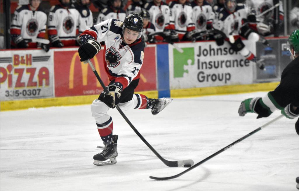 Kenai River Brown Bears forward Landon MacDonald shoots the puck against the Chippewa (Wisconsin) Steel on Sunday, Nov. 12, 2023, at the Soldotna Regional Sports Complex in Soldotna, Alaska. (Photo by Jeff Helminiak/Peninsula Clarion)