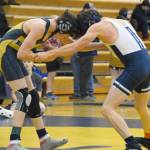 Homers Bryce Hagge competes against Soldotnas Grady Abrams at 112 pounds at the Homer Round Robin Rumble on Saturday, Nov. 11, 2023, at Homer High School in Homer, Alaska. (Photo by Finn Heimbold/Homer News)