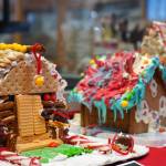 Gingerbread houses constructed by 7-year-olds Noah, Gavin and Tirzah are displayed as part of the 11th Annual Gingerbread House Contest at the Kenai Chamber of Commerce and Visitor Center in Kenai, Alaska, on Thursday, Nov. 16, 2023. (Jake Dye/Peninsula Clarion)