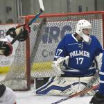 Palmer goalie Keagon O'Bryan makes a save against Kenai Central on Thursday, Nov. 16, 2023, during Kenai River Cup play at the Kenai Multi-Purpose Facility in Kenai, Alaska. (Photo by Jeff Helminiak/Peninsula Clarion)