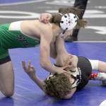 Seward junior Tommy Jamig tries to get a reversal against South Anchorages Dylan Frawner during the 103-pound final of the Lancer Smith Memorial on Saturday, Nov. 18, 2023, at the Menard Arena in Wasilla, Alaska. (Photo by Jeremiah Bartz/Frontiersman)