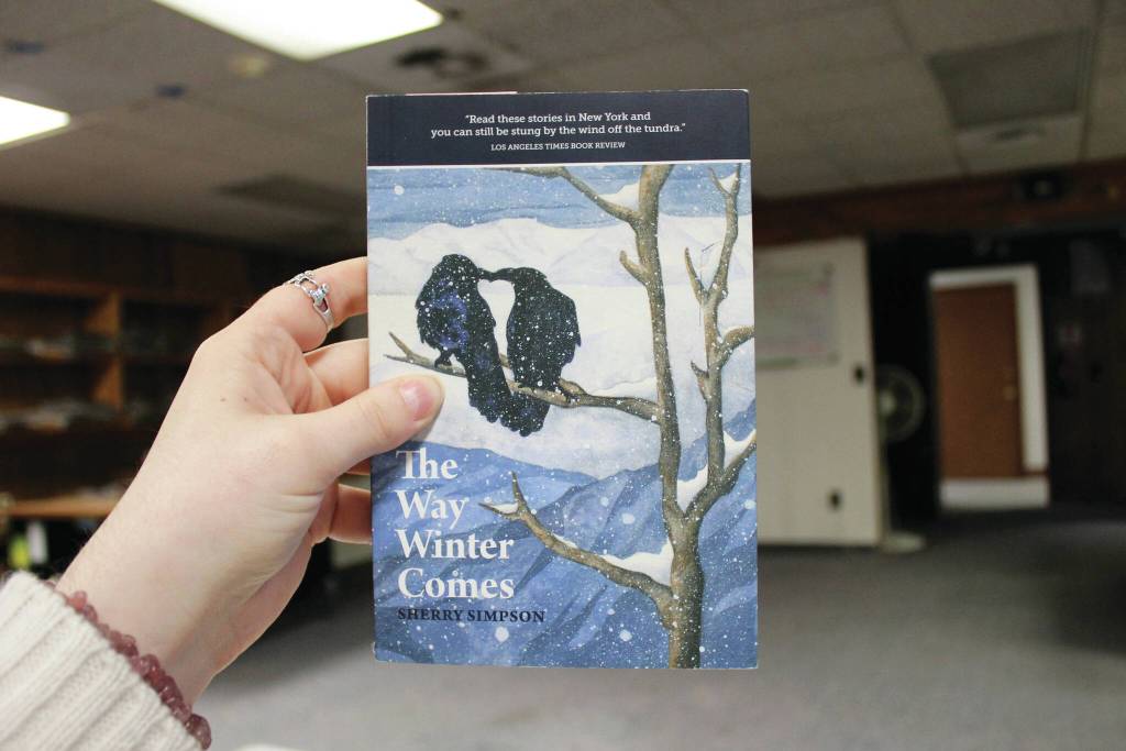 Ashlyn OHara/Peninsula Clarion
A copy of Sherry Simpsons The Way Winter Comes is held in the Peninsula Clarion offices on Tuesday in Kenai.