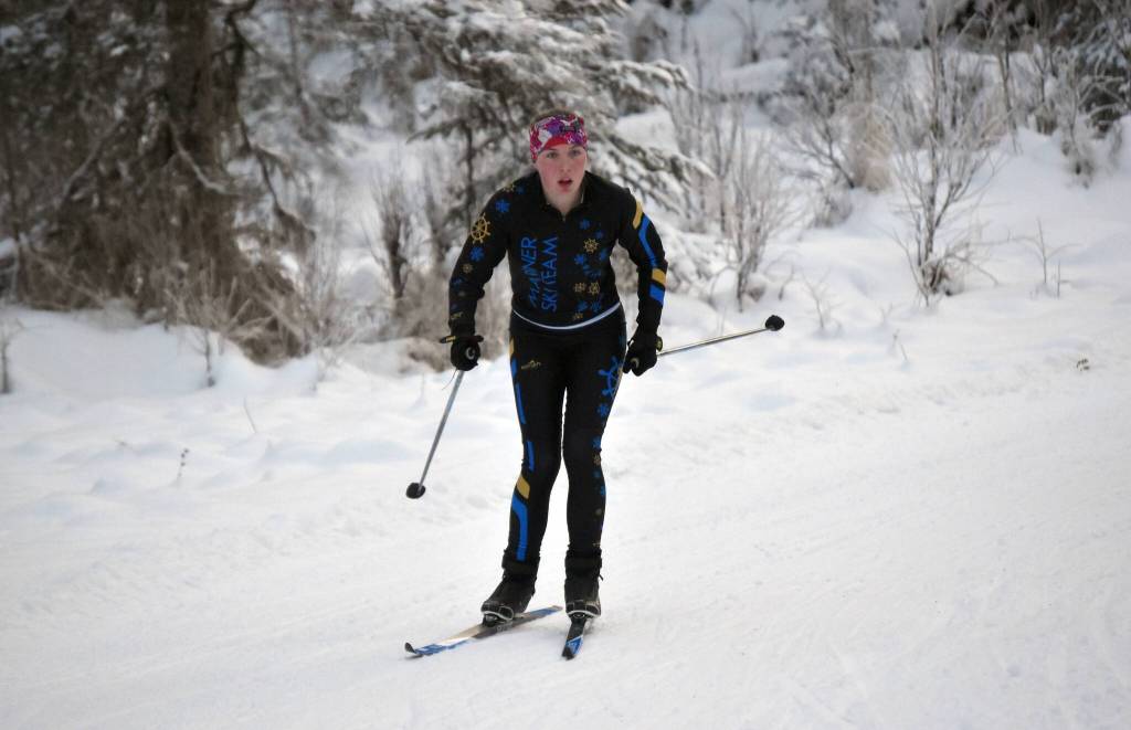 Homers Jaela Marchbanks rounds a corner at the Turkey Skate on Tuesday, Nov. 21, 2023, at Tsalteshi Trails just outside of Soldotna, Alaska. (Photo by Jeff Helminiak/Peninsula Clarion)