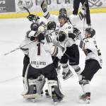 The Kenai River Brown Bears celebrate a win over the Anchorage Wolverines on Friday, Dec. 1, 2023, at the Soldotna Regional Sports Complex in Soldotna, Alaska. (Photo by Jeff Helminiak/Peninsula Clarion)