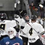 Kenai River Brown Bears defenseman Joe Manning celebrates his goal with Marko Giourof and Gavin Duckworth on Friday, Dec. 1, 2023, at the Soldotna Regional Sports Complex in Soldotna, Alaska. (Photo by Jeff Helminiak/Peninsula Clarion)