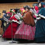 The Kenai Performers Victorian Carolers perform during Christmas in the Park at Soldotna Creek Park in Soldotna, Alaska, on Saturday, Dec. 2, 2023. (Jake Dye/Peninsula Clarion)