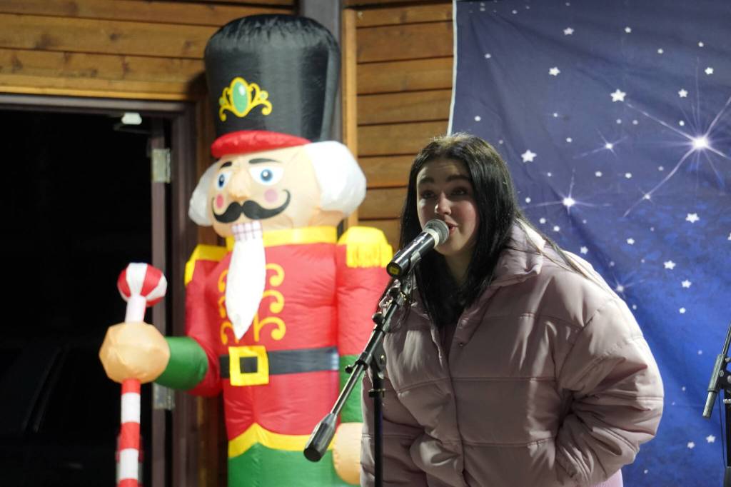 Charli Byrd performs during Christmas in the Park at Soldotna Creek Park in Soldotna, Alaska, on Saturday, Dec. 2, 2023. (Jake Dye/Peninsula Clarion)