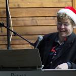 Josiah Burton performs during Christmas in the Park at Soldotna Creek Park in Soldotna, Alaska, on Saturday, Dec. 2, 2023. (Jake Dye/Peninsula Clarion)